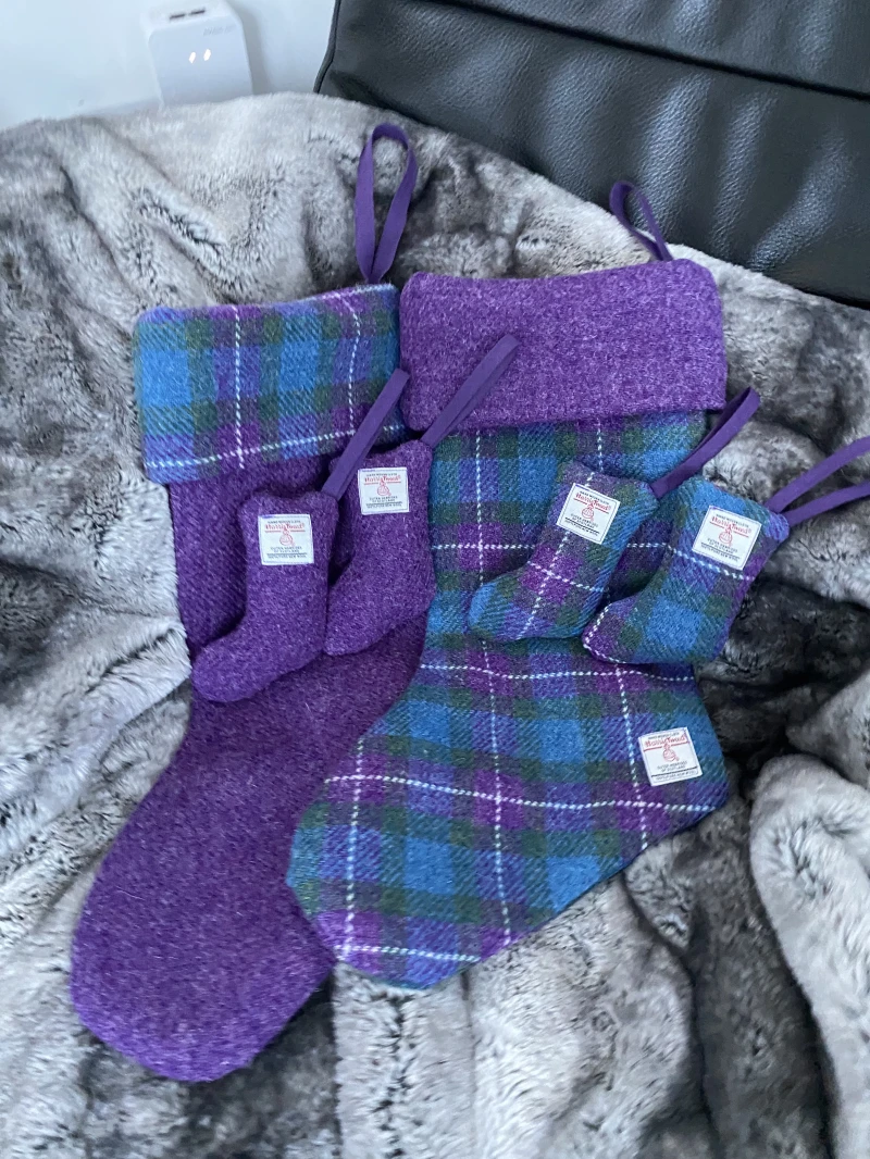 Purple Christmas stocking in Harris Tweed check and plain fabric.