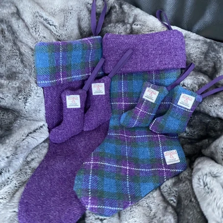 Purple Christmas stocking in Harris Tweed check and plain fabric.