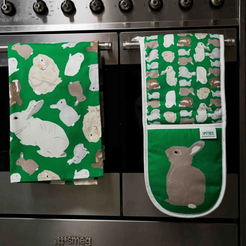rabbits oven gloves tea towel stove front