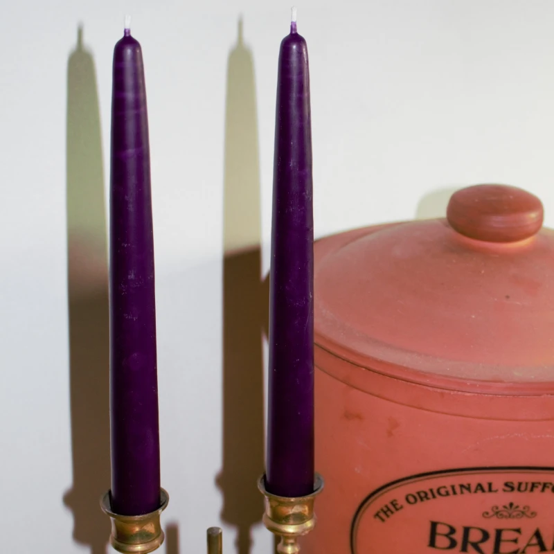Traditional dipped deep purple beeswax candles