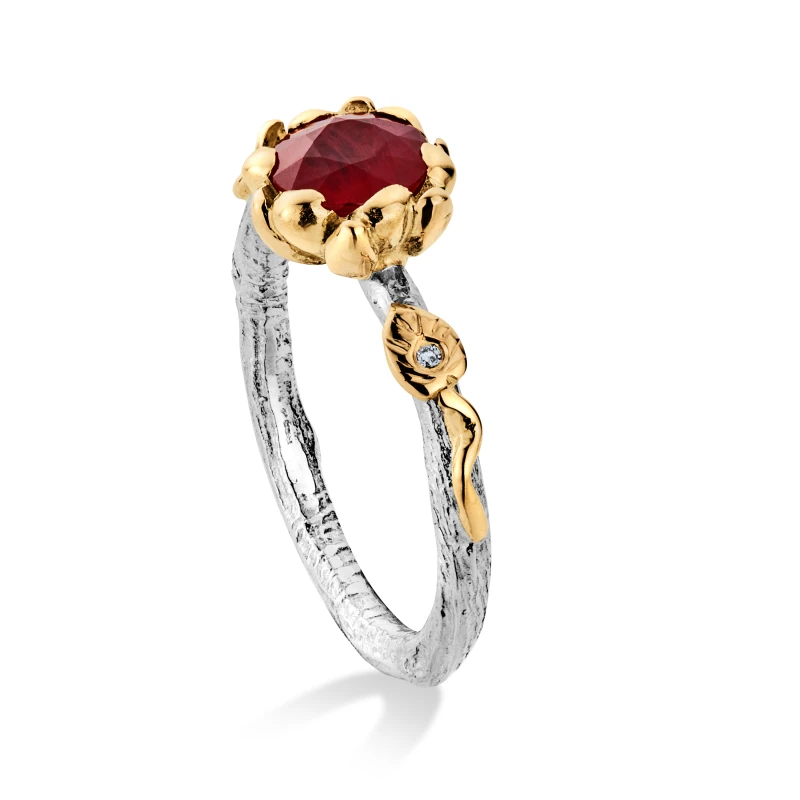 Sunflower ruby ring with platinum twig shank and Welsh gold leaves