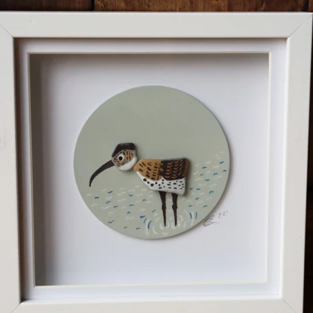 Curlew framed sea glass and wood