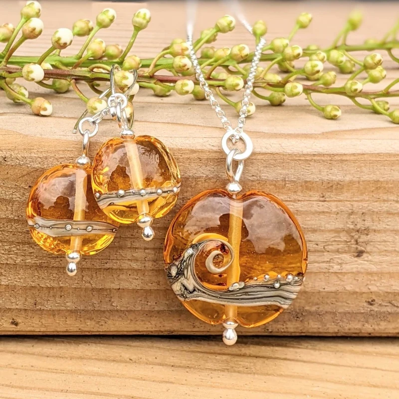 Shoreline Amber lentil pendant and earrings