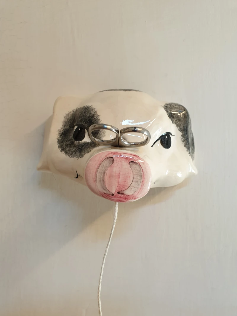 Ceramic animal string holder