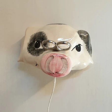 Ceramic animal string holder