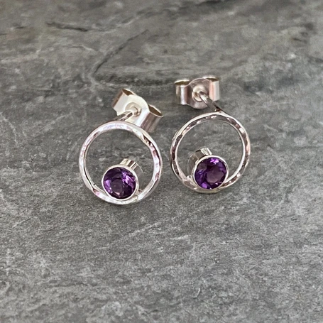 Tiny silver circles studs with amethyst stones
