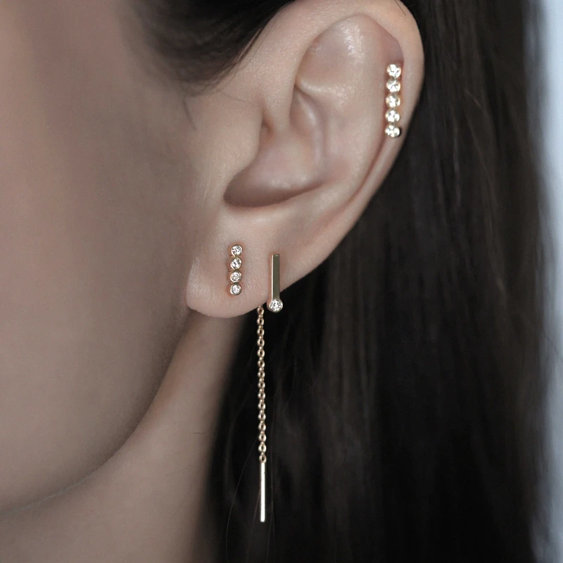 the minimalist curated ear luxury piercing lena cohen jewellery 18k gold