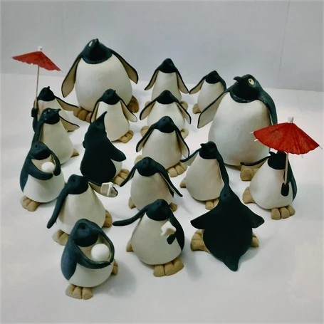 colony of ceramic penguins
